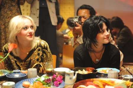 Dakota Fanning and Kristen Stewart bask in The Runaways success