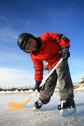 Child playing hockey
