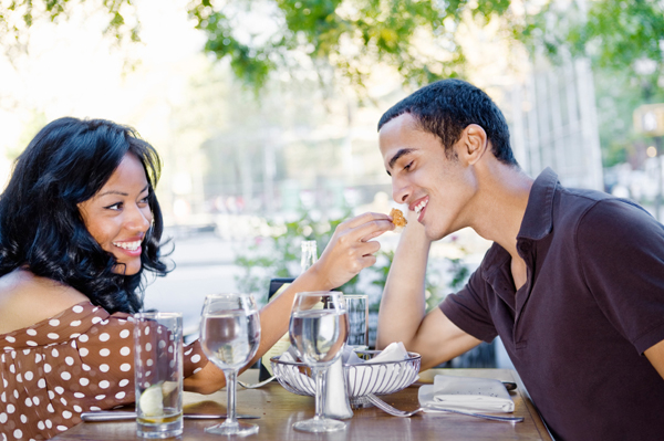 Couple eating outdoors