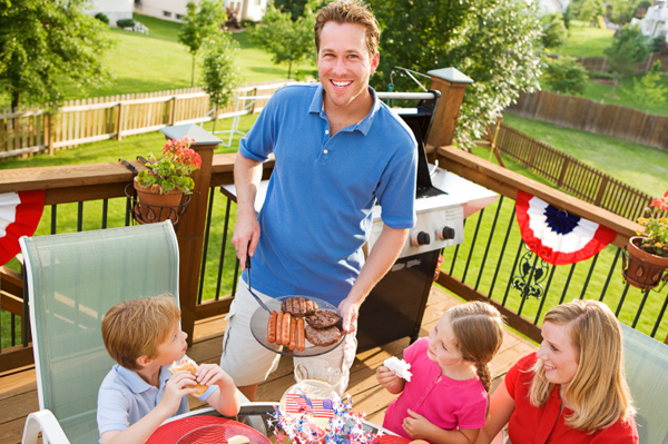 Family having BBQ dinner
