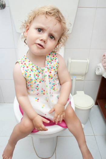 Little girl on toliet