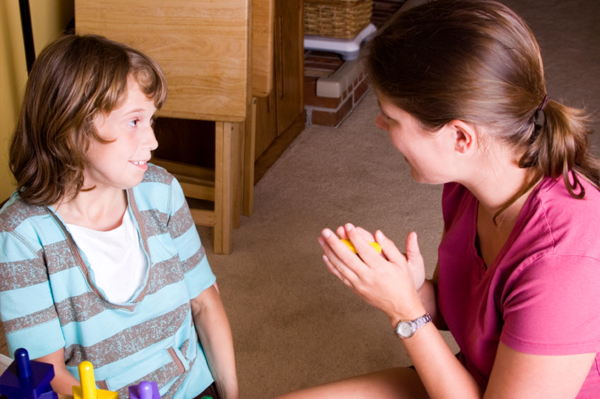 Special needs child with caregiver