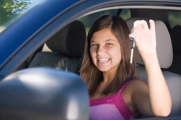 Teen girl with car