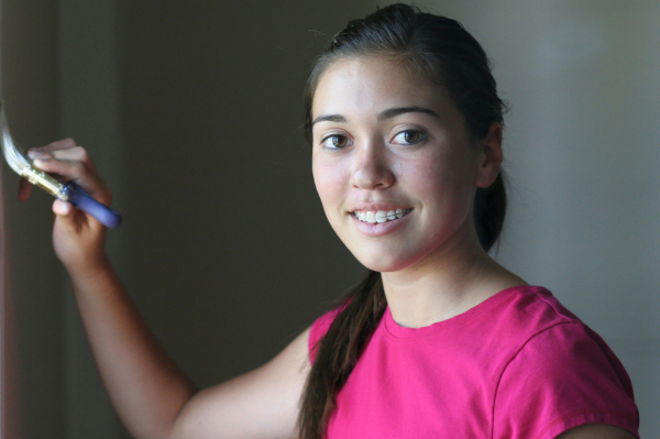 Tween girl painting