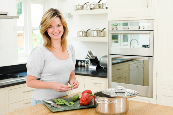 Woman using cutting board