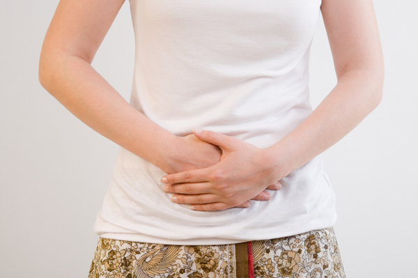 Woman with stomach pains