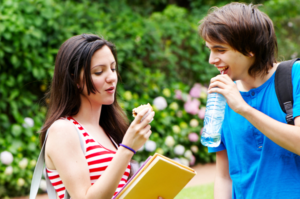 Woman eating sandwich