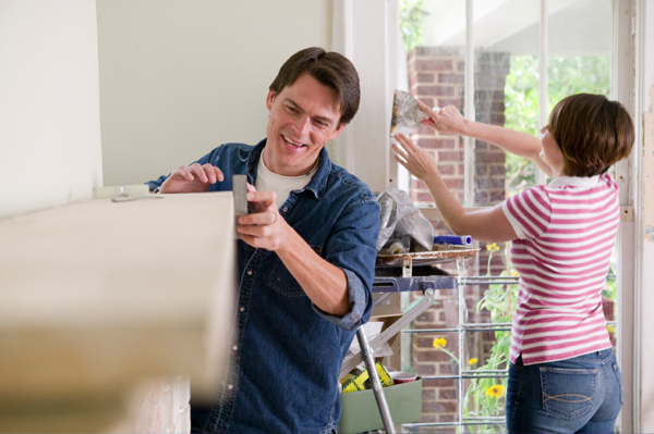 Couple remodeling house