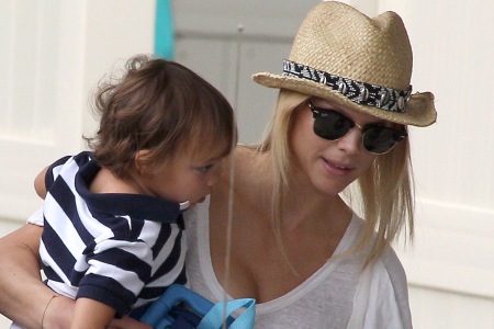 Elin Nordegren takes a Tiger cub out for the day