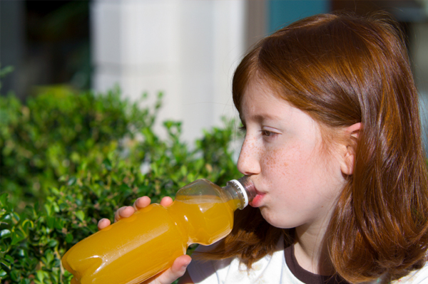 Girl drinking homemade juice