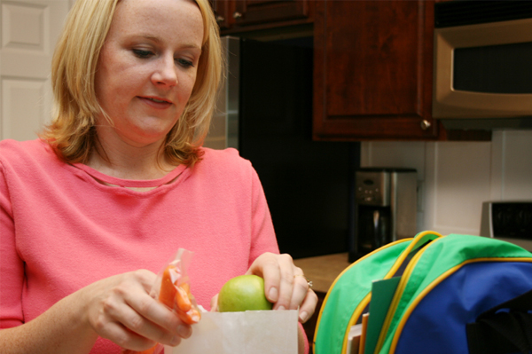 Mom packing lunch for school