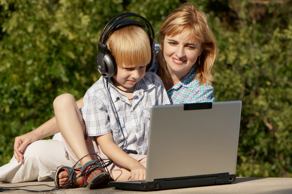Mom and son creating summer playlist