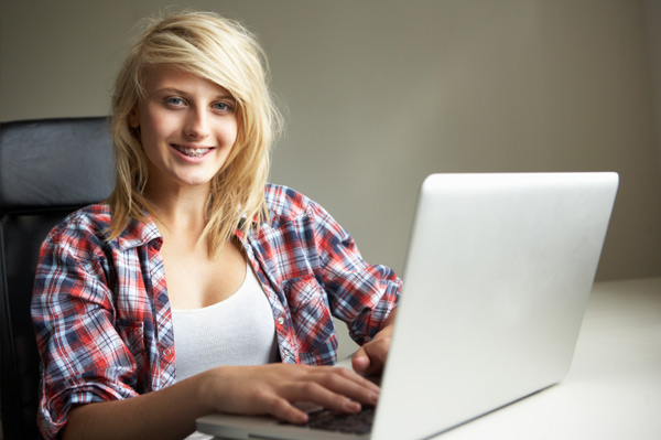 Teen girl on computer