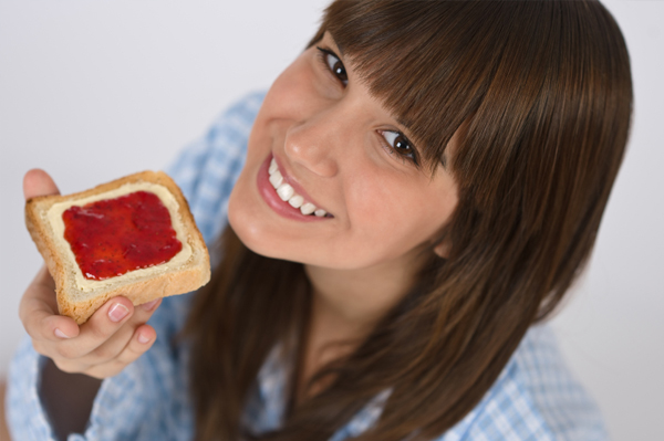 Woman eating toast