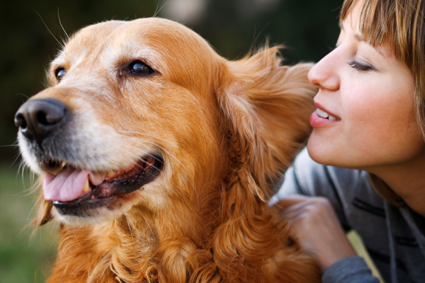 Woman with golden retriever