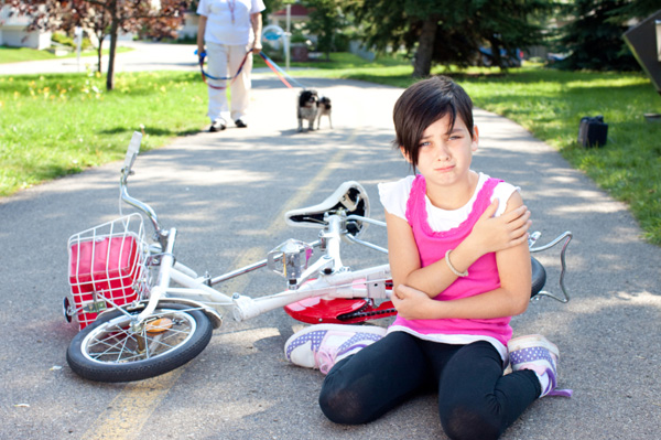 Girl fallen off bike