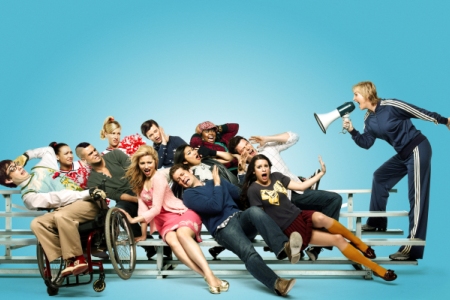 Jane Lynch meances the cast of Glee