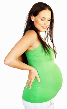 pregnant woman wearing a green shirt