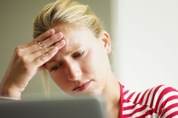 Stressed woman at work