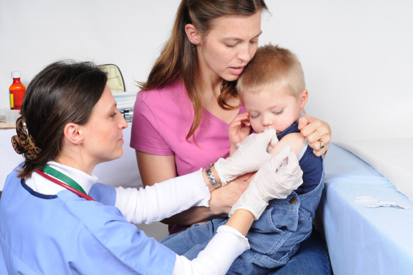 Toddler getting vaccinated