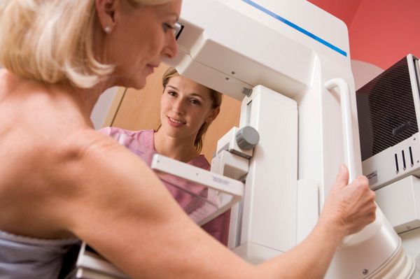 Woman getting mamogram
