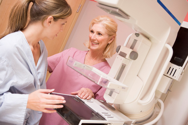 Young woman having mamogram