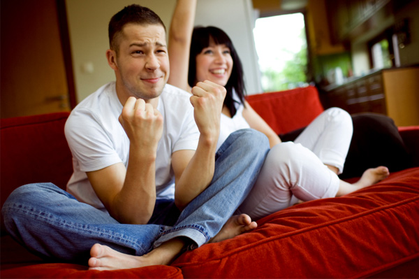 Couple watching sports