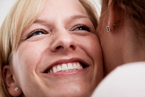 Woman hugging friend