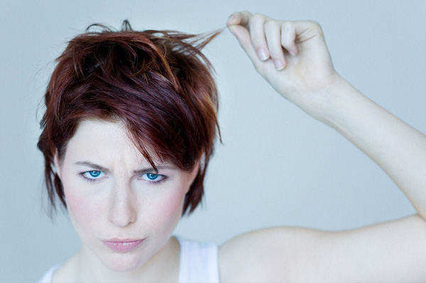Woman upset with hair color