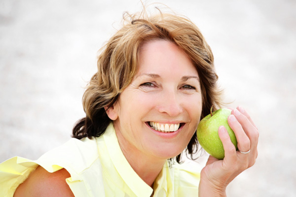Woman with apple