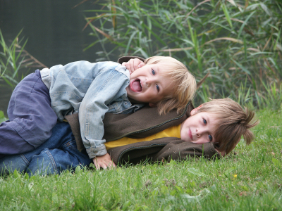 Brothers playing outside