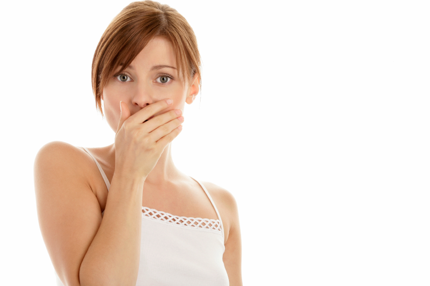 Woman covering mouth