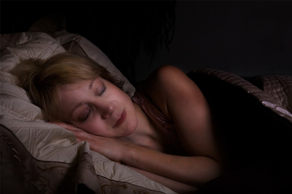 Woman sleeping in bed