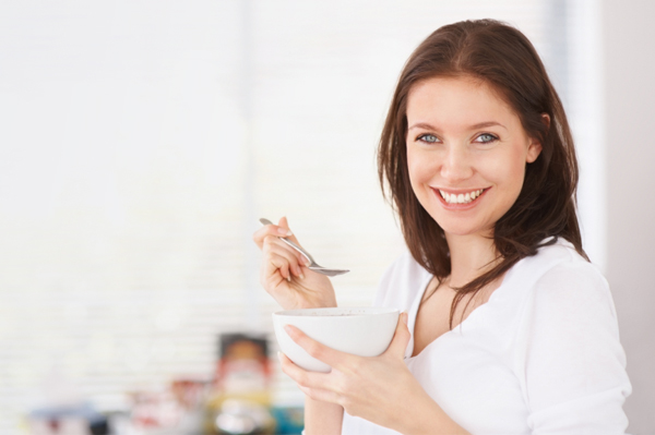 Woman eating cereal