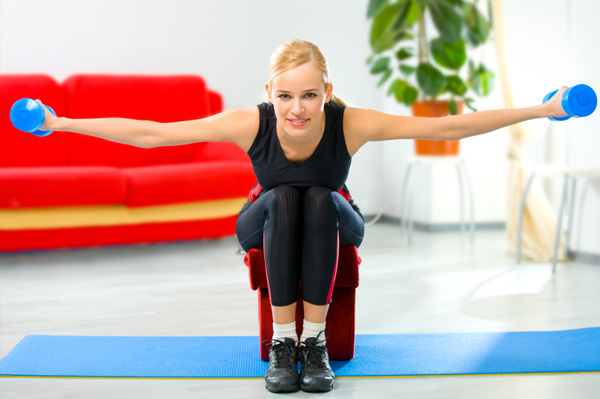 Woman with dumbells