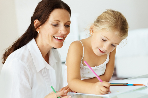 Mom an daughter writing thank you note
