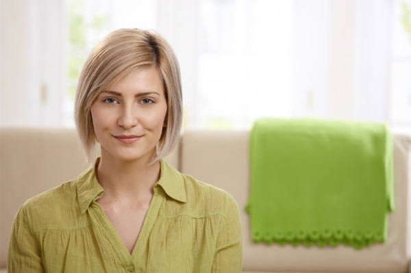 Woman in organized living room