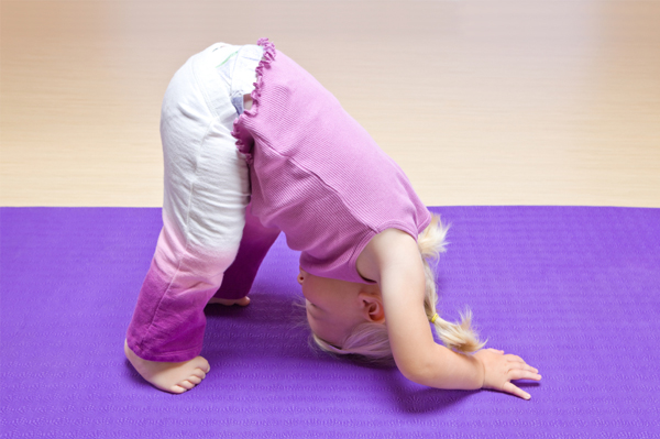 Toddler doing yoga