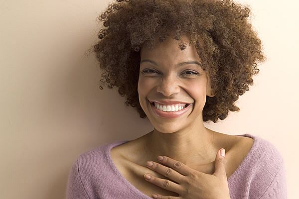 Smiling, confident woman.