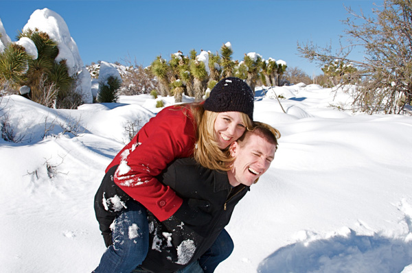 Couple playing in the snow
