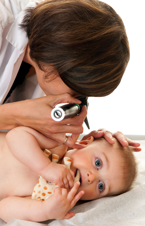 Doctor looking in baby's ear