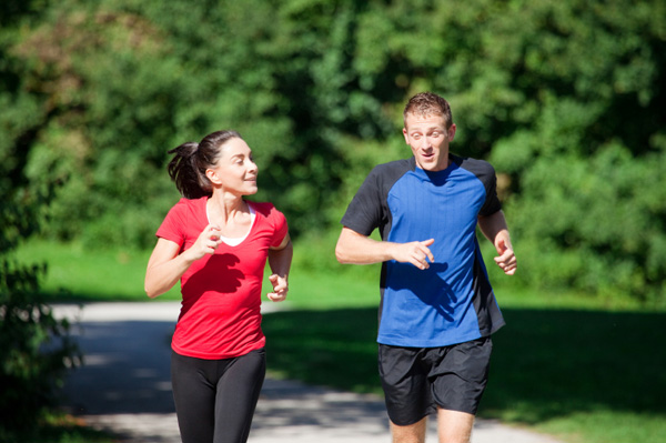 Happy couple running
