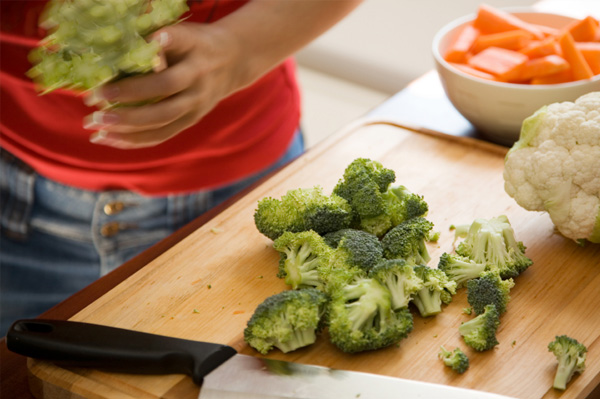Woman chopping vegetables