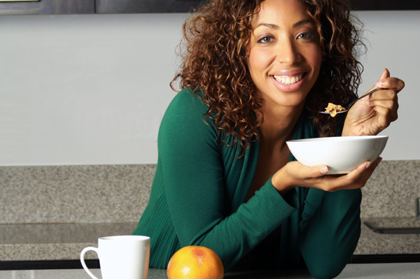 Woman eating cereal