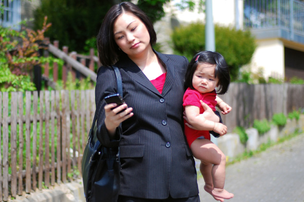 Working mom with blackberry