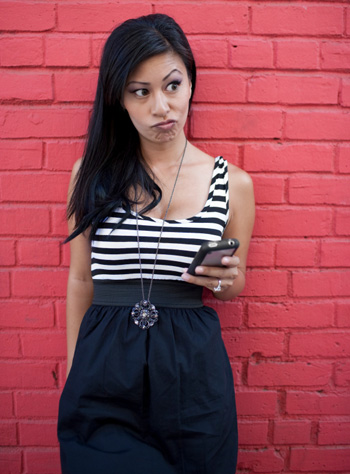 Confused woman on phone