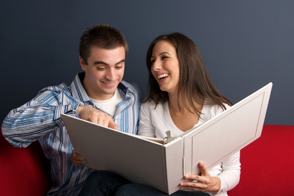 Couple looking at photo album