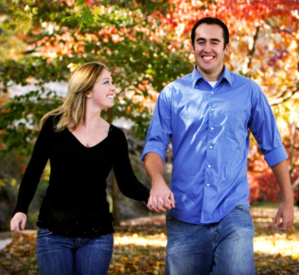 Happy couple holding hands