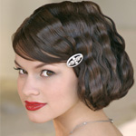 Brunette woman with short bob haircut with bangs