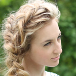 Blonde woman with long spring braided hairstyle